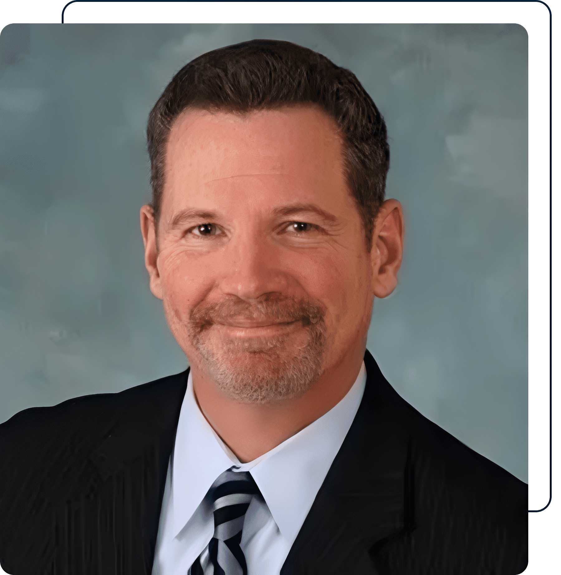 Professional headshot of a businessman